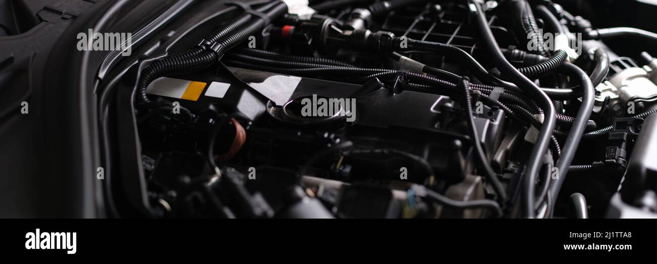 Changing the oil in the engine of the car, parts under the hood Stock Photo Alamy