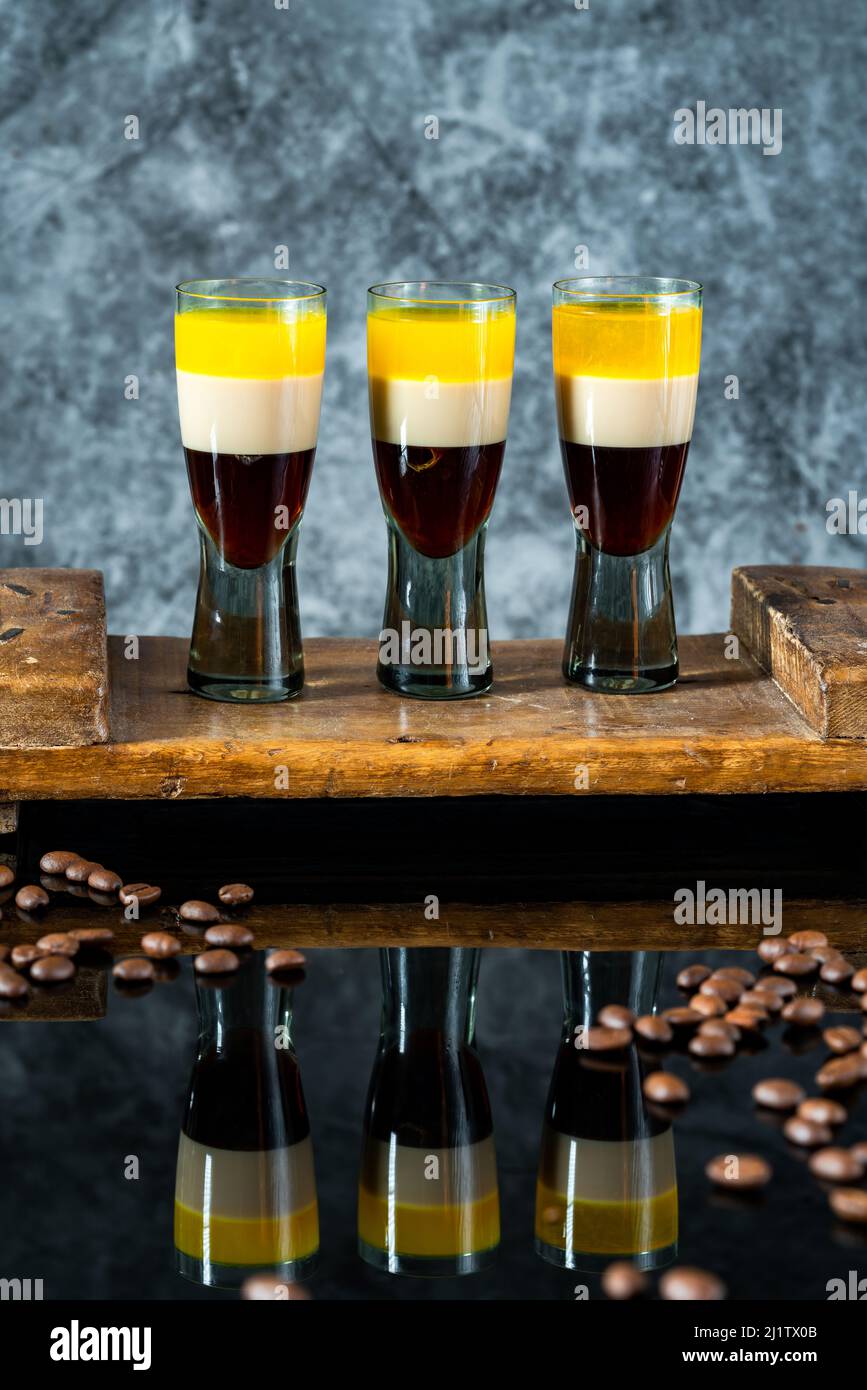 B-52 cocktail - layered shot composed of coffee liqueur, Irish cream and orange liqueur Stock Photo