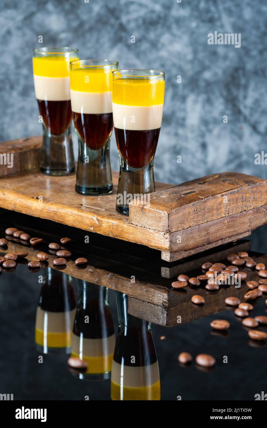 B52 cocktail layered shot composed of coffee liqueur, Irish cream