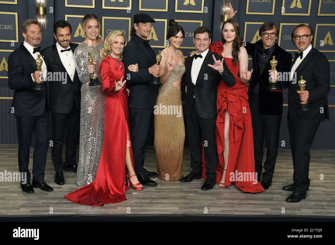 (L-R) Patrick Wachsberger, Eugenio Derbez, Sian Heder, Marlee Matlin, Troy Kotsur, Emilia Jones, Daniel Durant, Amy Forsyth, Philippe Rousselet, and Fabrice Gianfermi, winners of the Best Picture award for ‘CODA’,  posing on stage in the press room at the 94th Academy Awards held at the Dolby Theatre in Hollywood, CA on Sundayday, ?March 27, 2022. (Photo By Sthanlee B. Mirador/Sipa USA) Stock Photo
