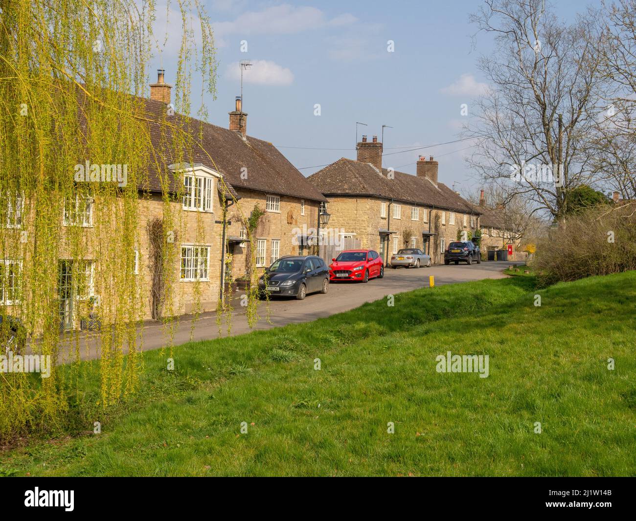 Street view in Spring in the attractive hamlet of Courteenhall, Northamptonshire, UK Stock Photo