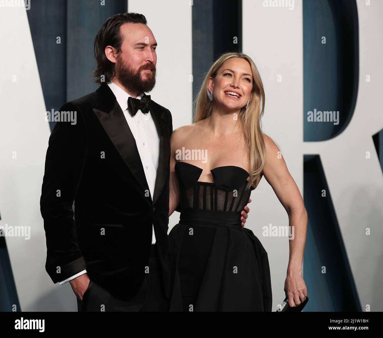 Kate Hudson and Danny Fujikawa arrive at the Vanity Fair Oscar party during the 94th Academy Awards in Beverly Hills, California, U.S., March 27, 2022. REUTERS/Danny Moloshok Stock Photo