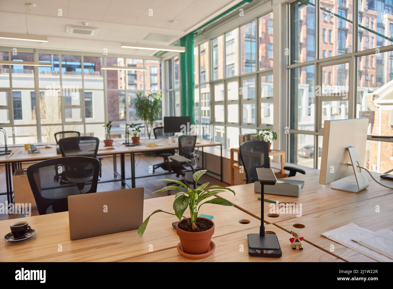 Interior of a modern office space at the end of the work day Stock Photo