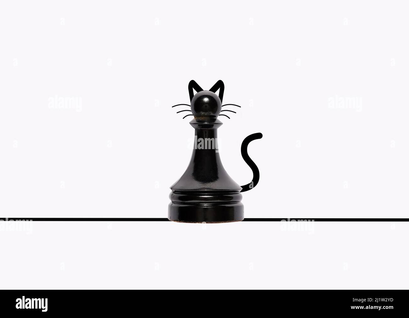 Chess pawn representing a black cat. Stock Photo