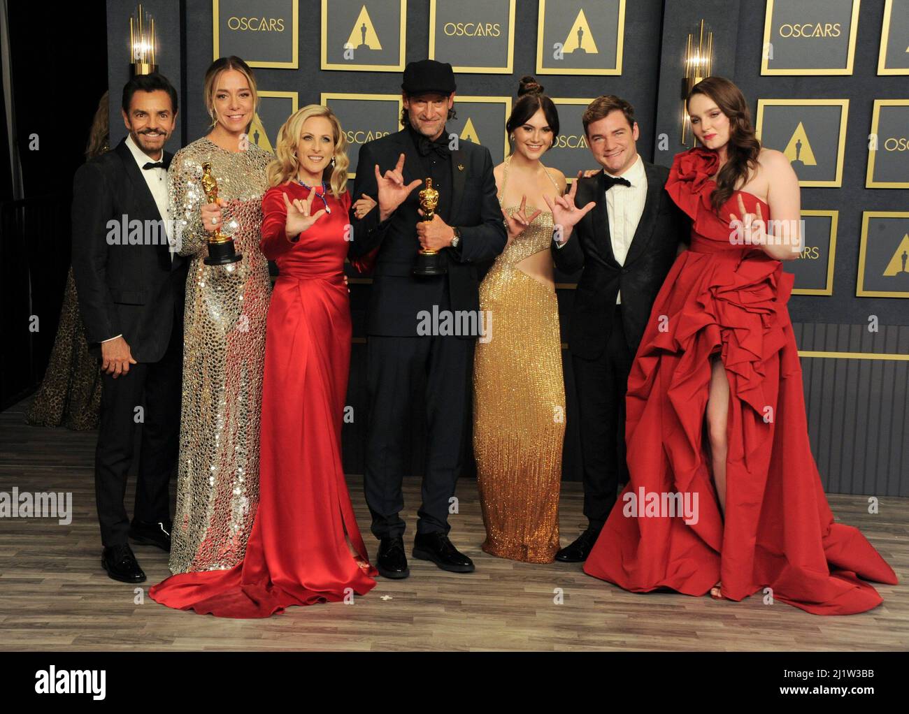 Los Angeles, CA. 27th Mar, 2022. Emilia Jones, Daniel Durant, Sian Heder, Marlee Matlin, Eugenio Derbez, Fabrice Gianfermi, Patrick Wachsberger, Troy Kotsur, Amy Forsyth, Philippe Rousselet in the press room for 94th Academy Awards - Press Room, Dolby Theatre, Los Angeles, CA March 27, 2022. Credit: Elizabeth Goodenough/Everett Collection/Alamy Live News Stock Photo