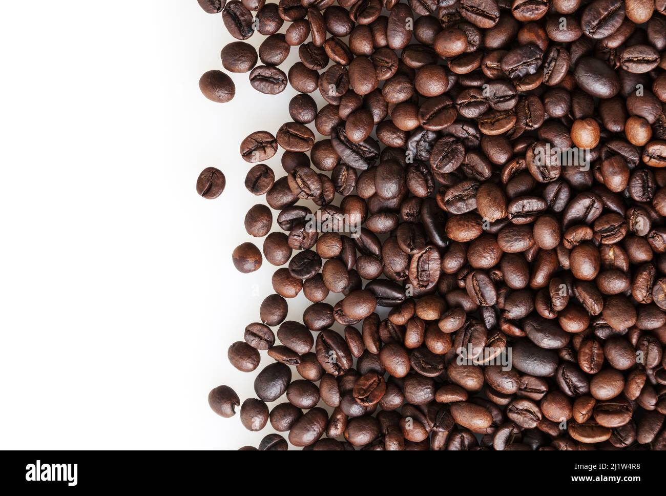 Roasted coffee beans on white background with copy space Stock Photo ...