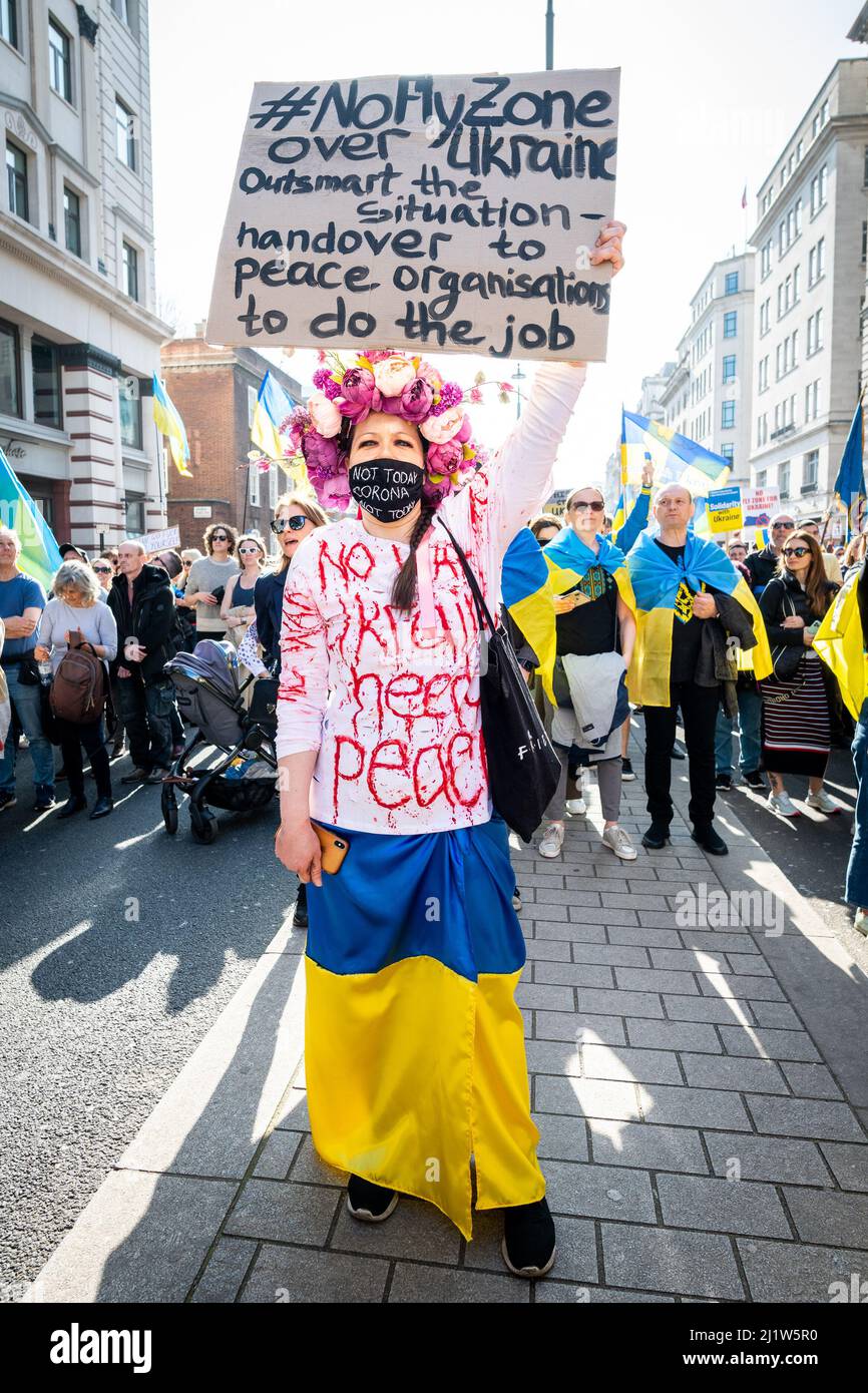 Thousands march in solidarity against the war in Ukraine. 'London Stands With Ukraine' shows the support for the Ukrainian people. Peace march London. Stock Photo
