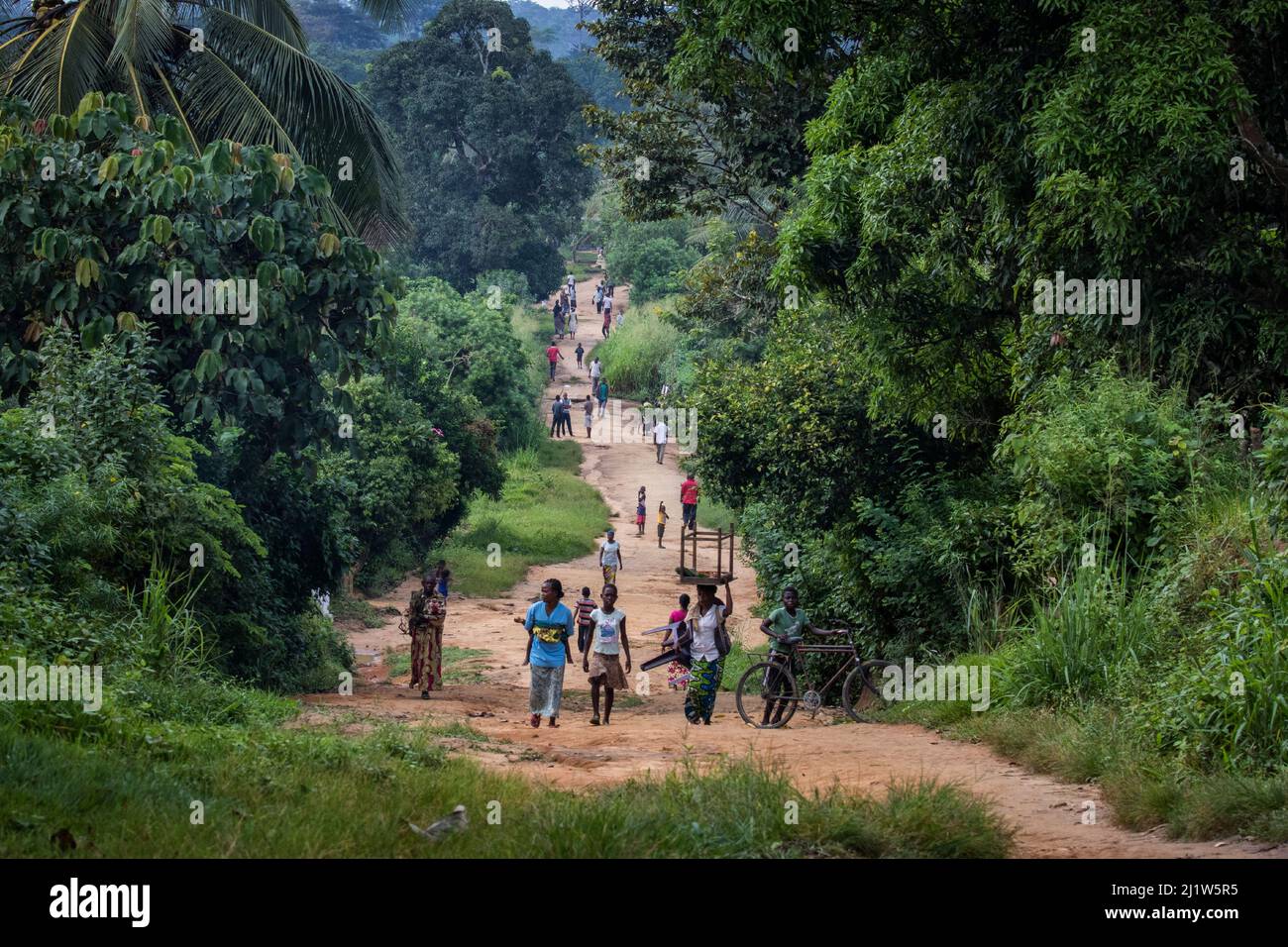 Group of people on busy road, Democratic Republic of Congo. May 2017. Stock Photo