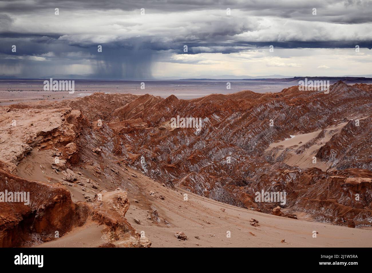 Heavy and unusual rainstorms on Cordillera de la Sal, Atacama desert, Los Flamencos National Reserve, Antofagasta Region, Chile, February Stock Photo