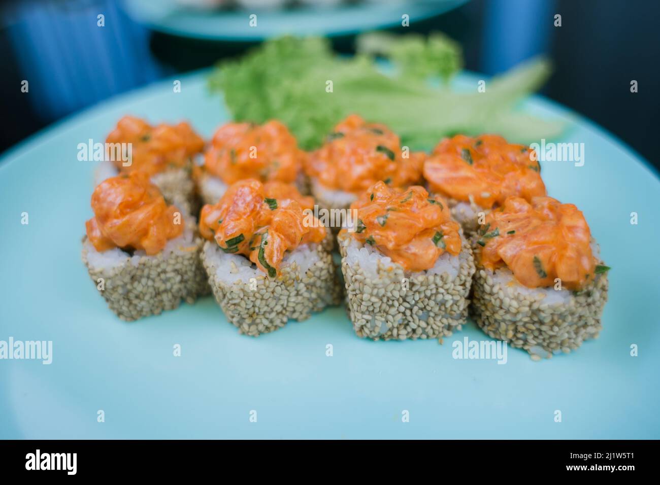 a Japanese roll with sesame seeds and rice Stock Photo - Alamy