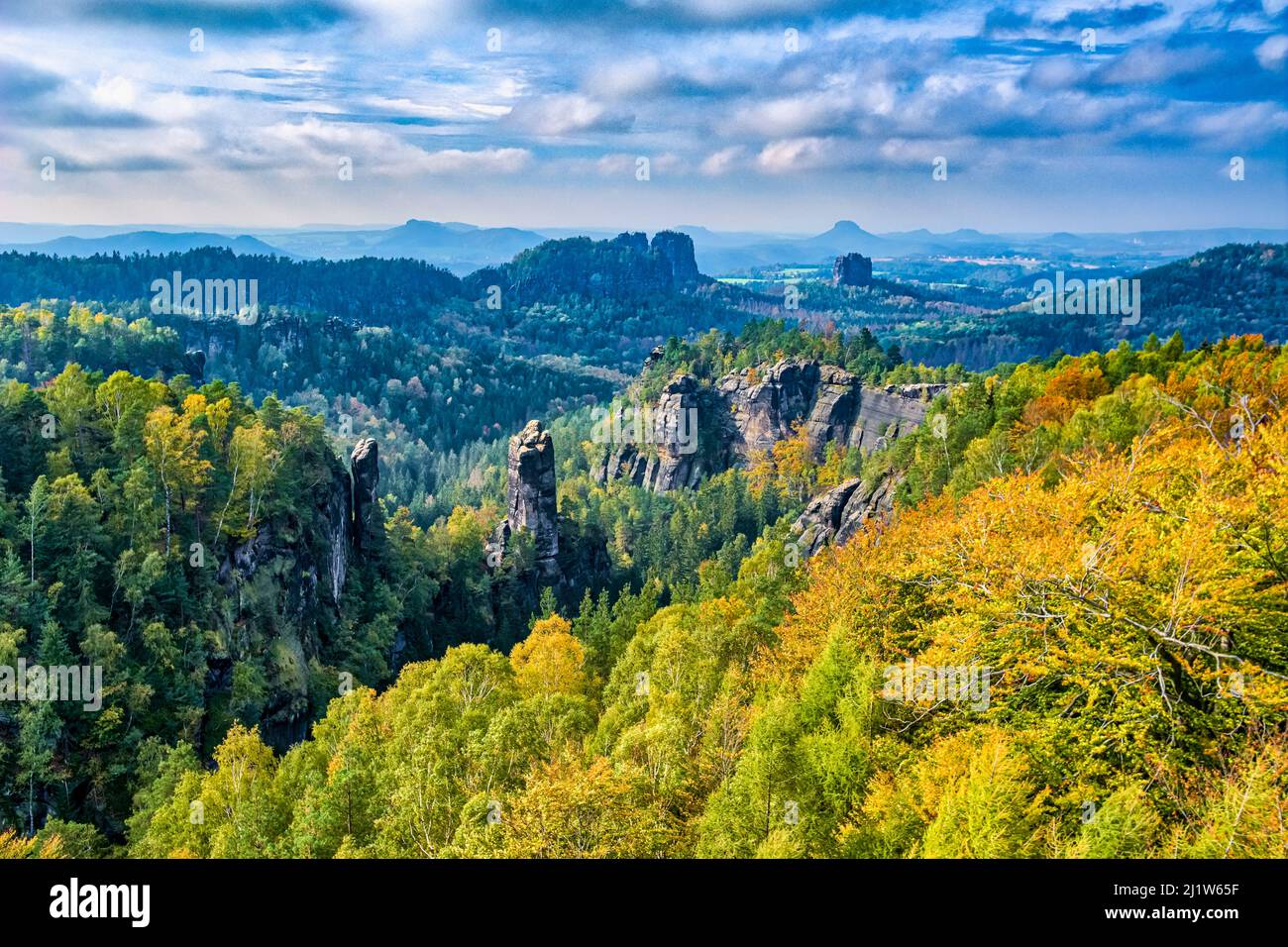 Landscape with rock formations and the summit Rhonspitze in Affensteine area of the Saxon Switzerland National Park in autumn. Stock Photo