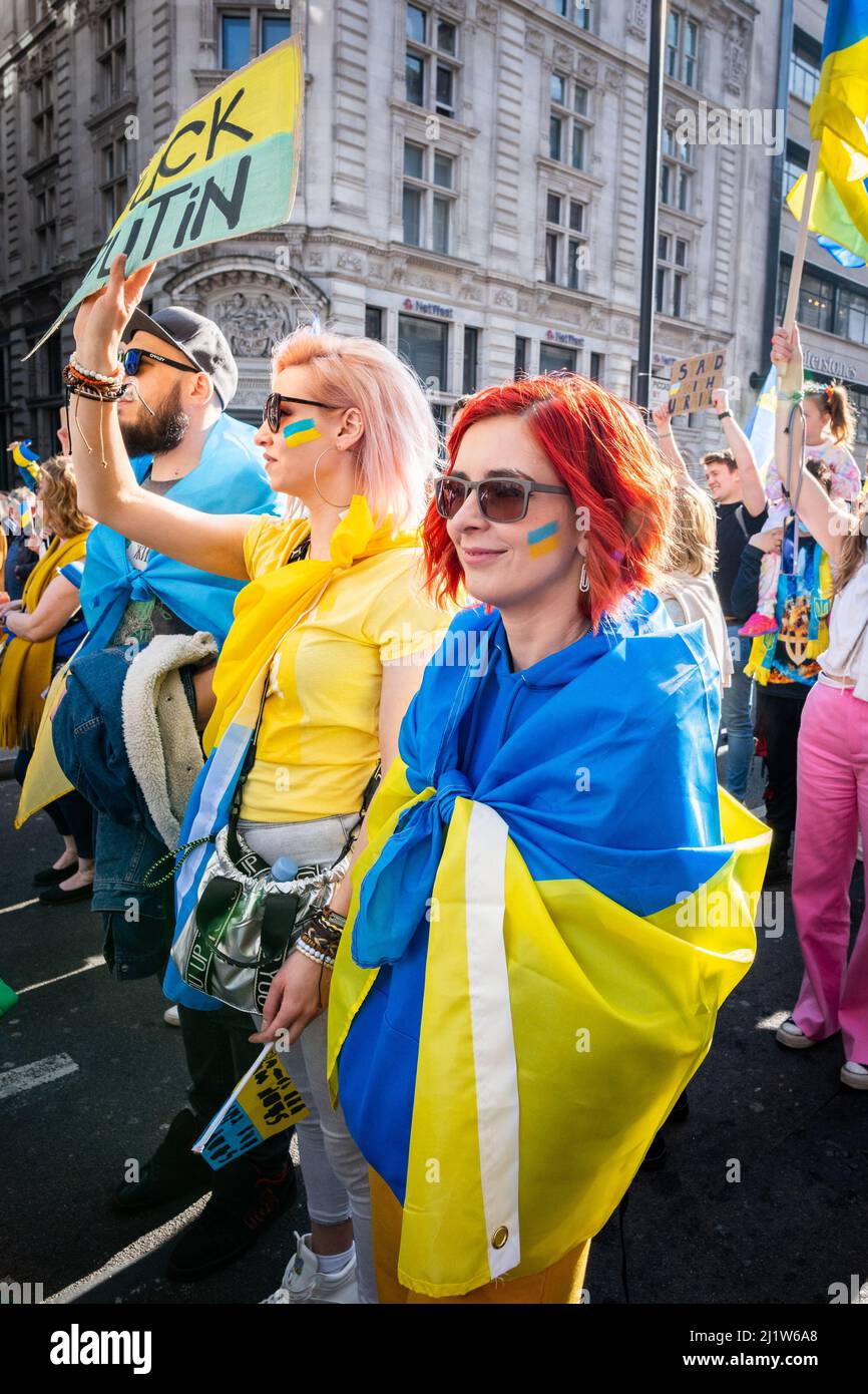 Thousands march in solidarity against the war in Ukraine. 'London Stands With Ukraine' shows the support for the Ukrainian people. Peace march London. Stock Photo