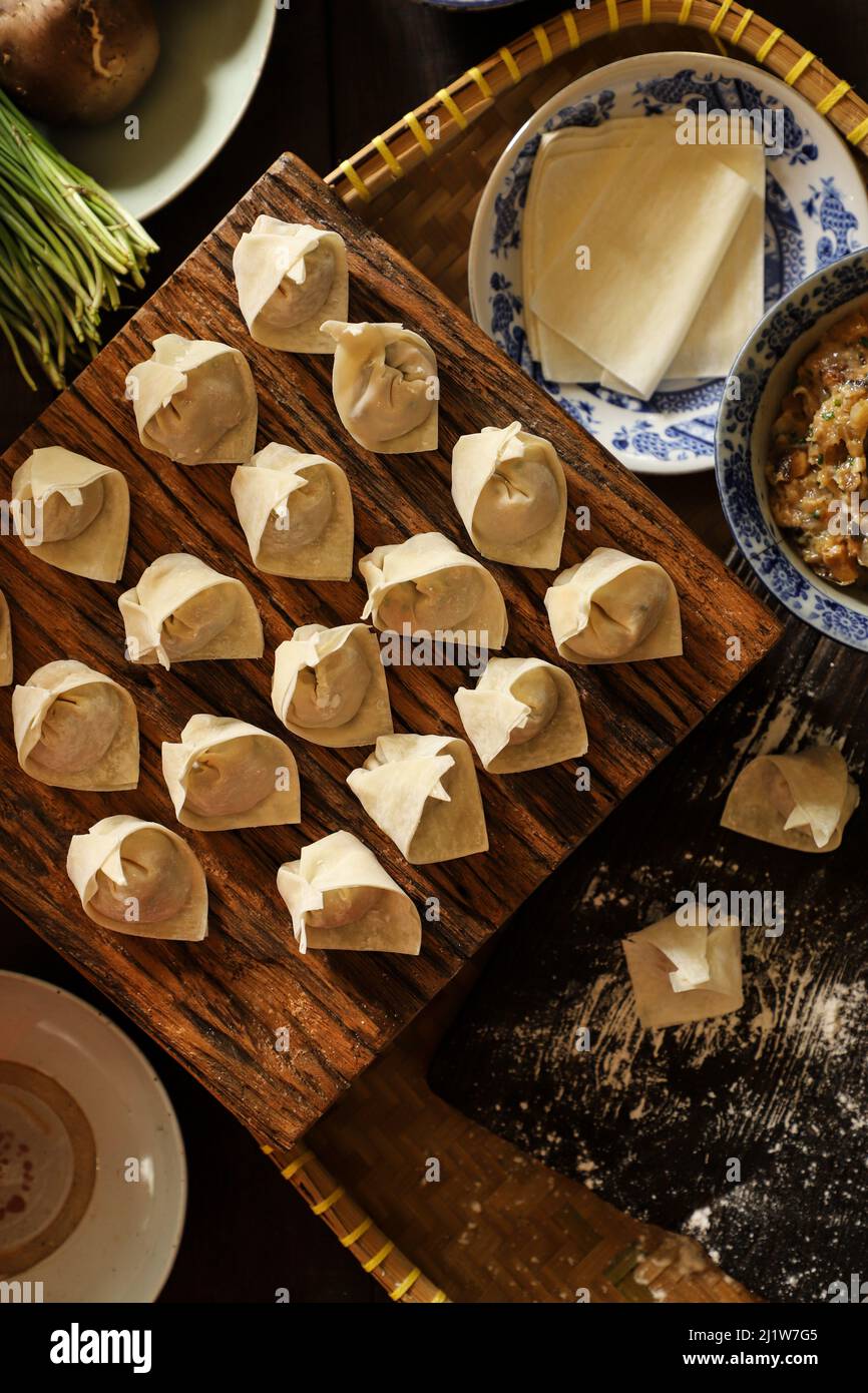 Freshly Made Wontons on Kitchen Countertop Stock Photo