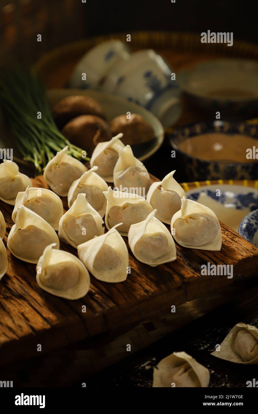 Freshly Made Wontons on Kitchen Countertop Stock Photo