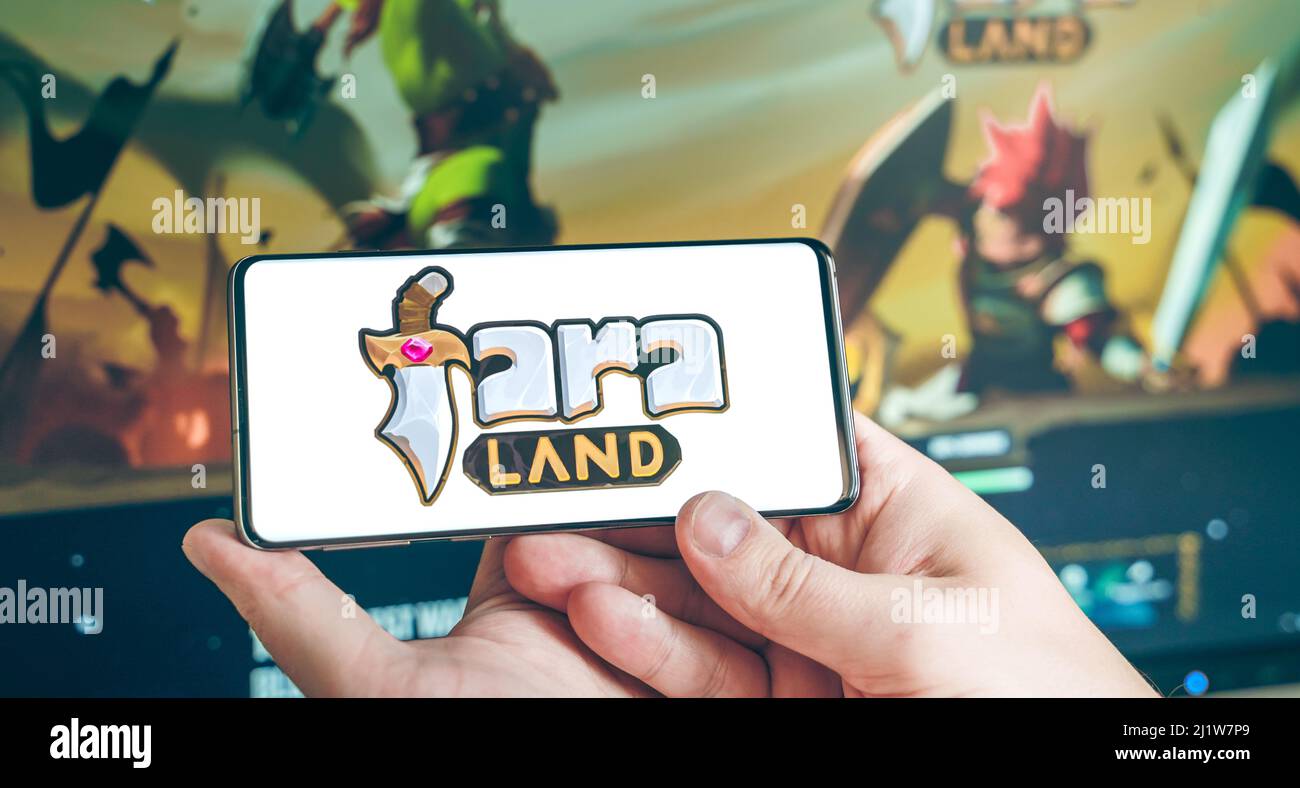 Russia Moscow 25.12.2021 Logo of Faraland. Fara token, blockchain nft  ethereum cryptocurrency strategy game in laptop,mobile phone.Man playing  for cry Stock Photo - Alamy