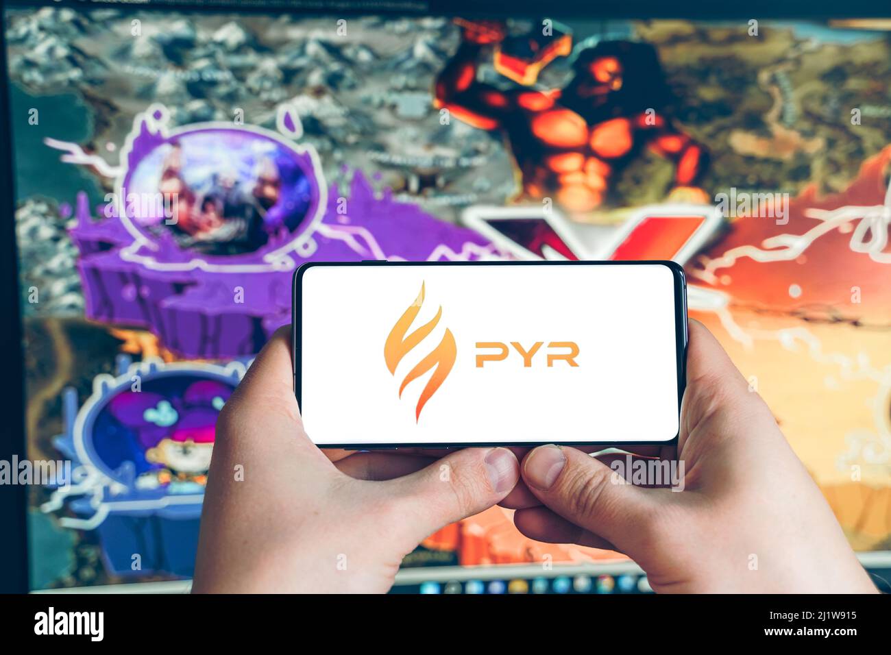 Russia Moscow 25.12.2021 Logo of Vulcan Forged.PYR token.Blockchain nft ethereum  cryptocurrency strategy game in laptop,mobile phone.Man playing for c Stock  Photo - Alamy