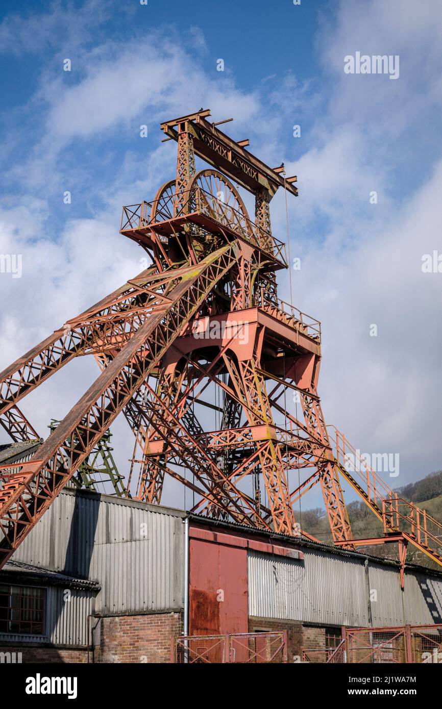 The old Lewis Merthyr pit head winding gear at the Rhondda Heritage Park Museum, Trehafod, South Wales Stock Photo