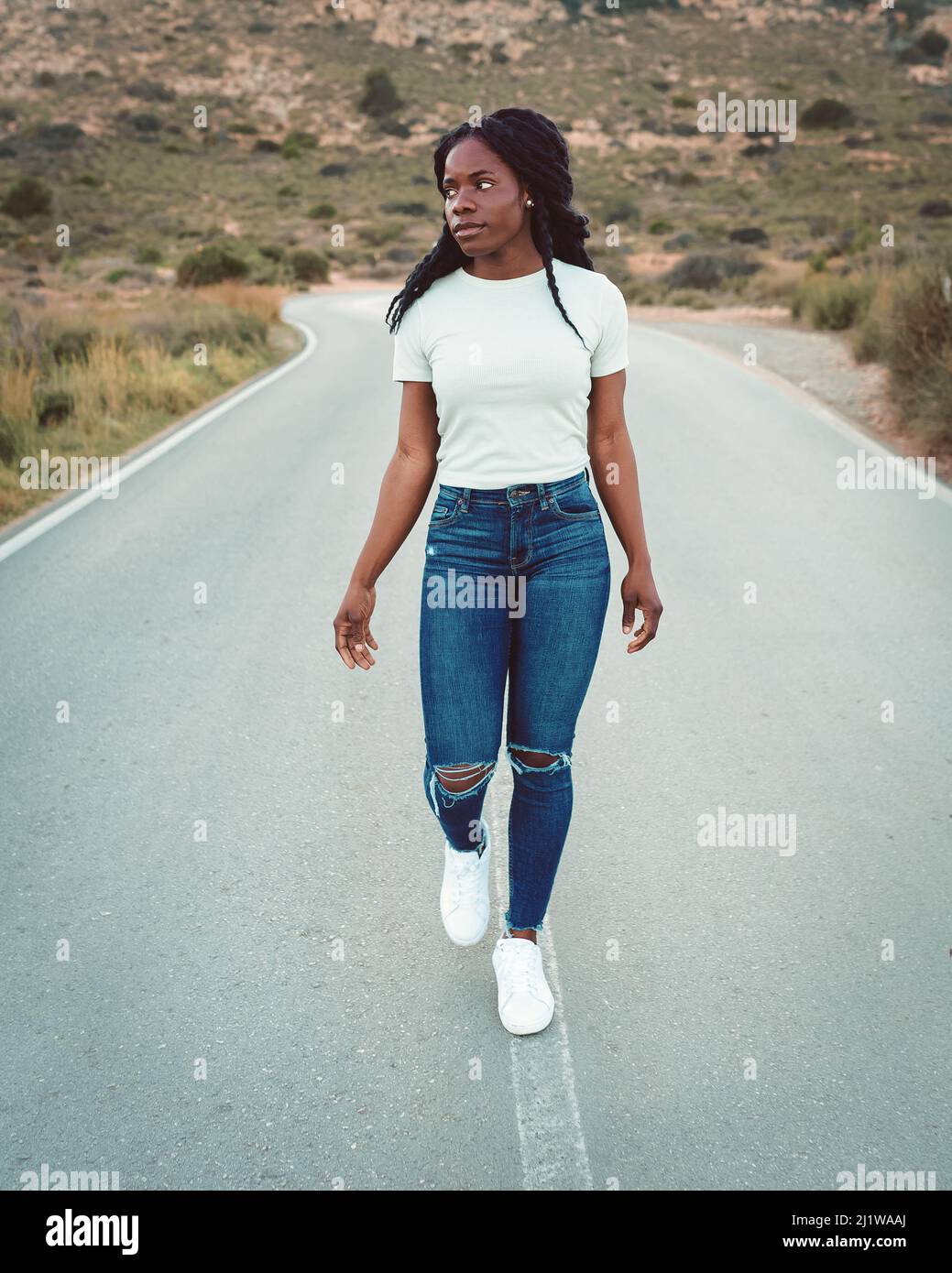 African american female walking hi-res stock photography and images - Alamy