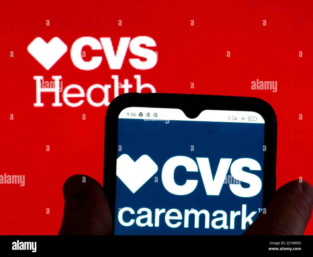 In this photo illustration, the CVS Caremark logo is displayed on a