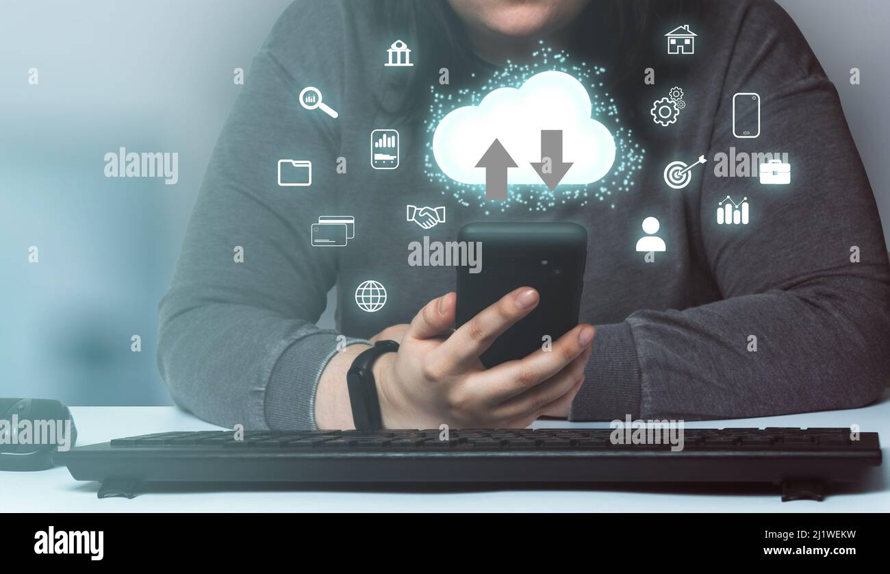 Woman using smartphone with cloud interface concept. Computing diagram. Internet of things. Data storage. Networking and internet service. Stock Photo