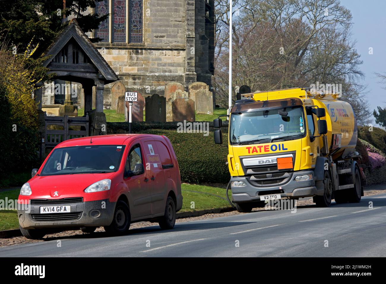 Tate oil lorry, delivering domestic heating oil to house in the village