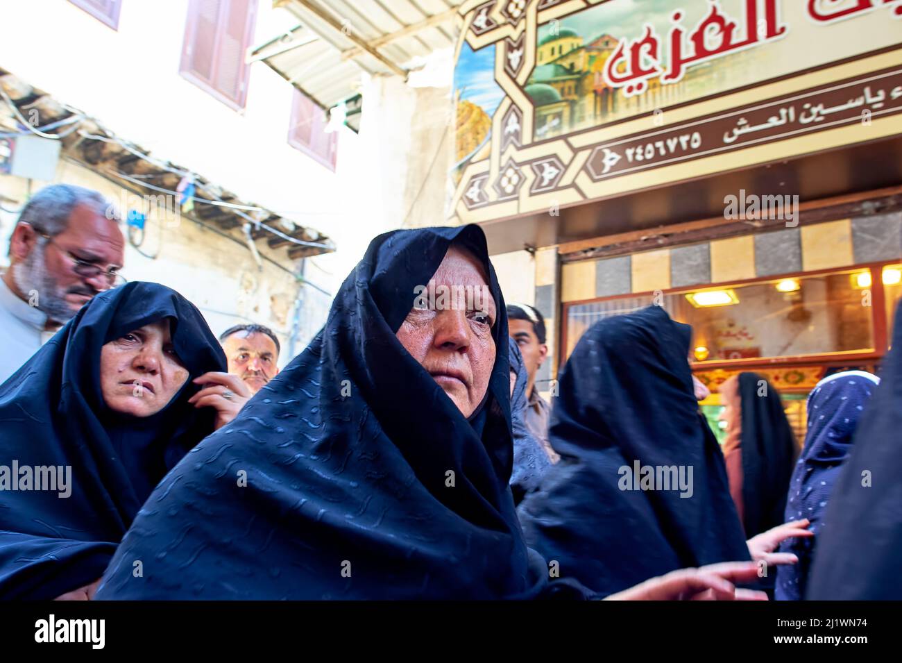 Syria. Damascus. Veiled women at Al-Hamidiyah Souq Stock Photo