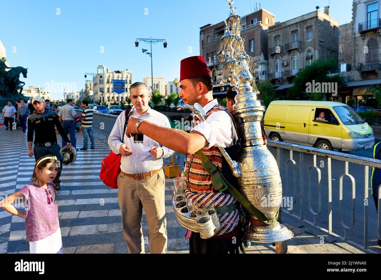 Syria. Damascus. Selling hot tea cups Stock Photo