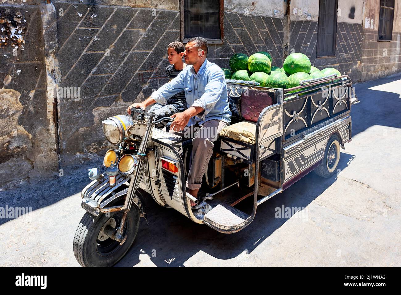 Syria. Carrying watermelons in the streets of Damascus. Stock Photo