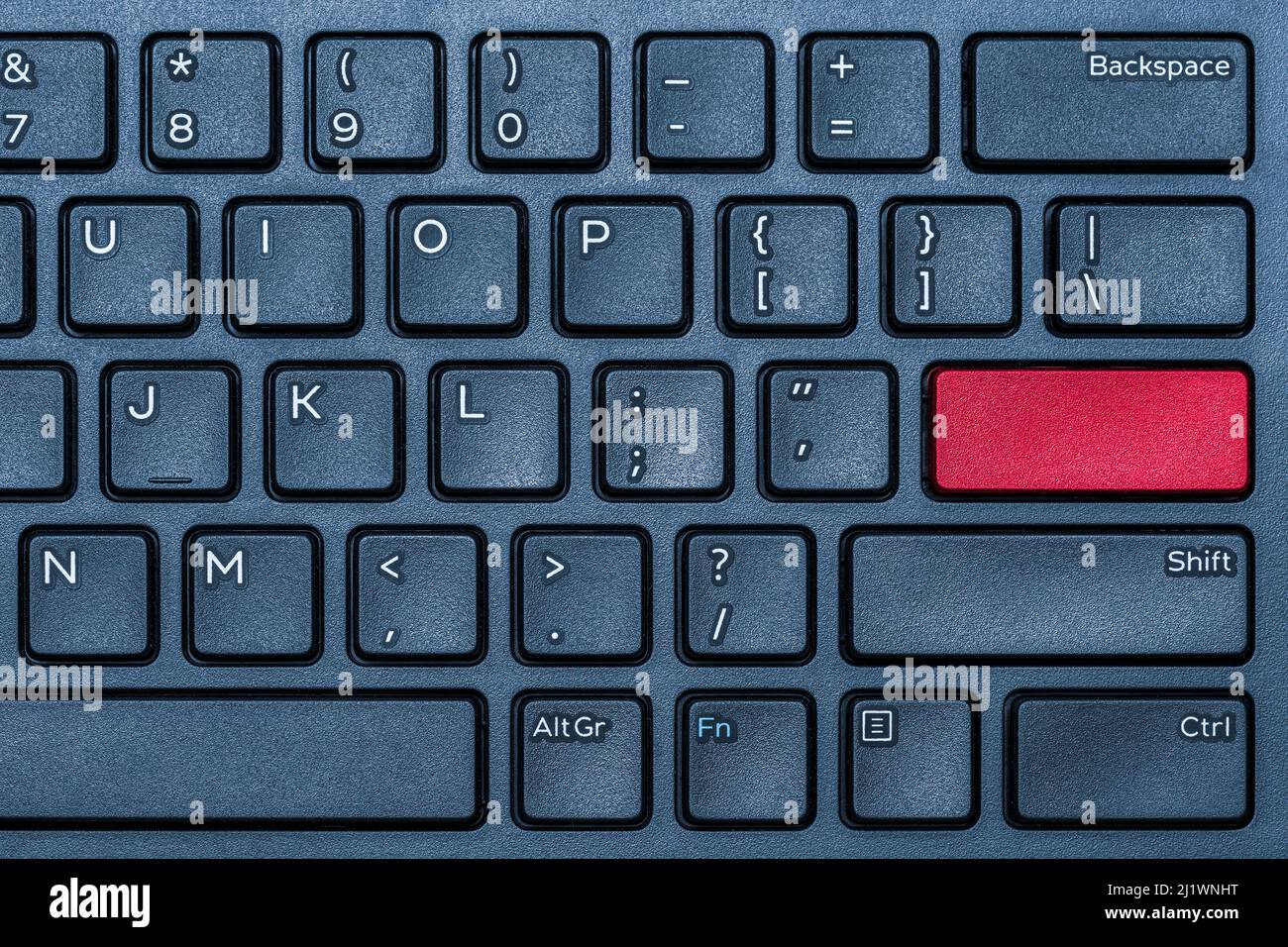Blank red button on the blue keyboard close-up Stock Photo