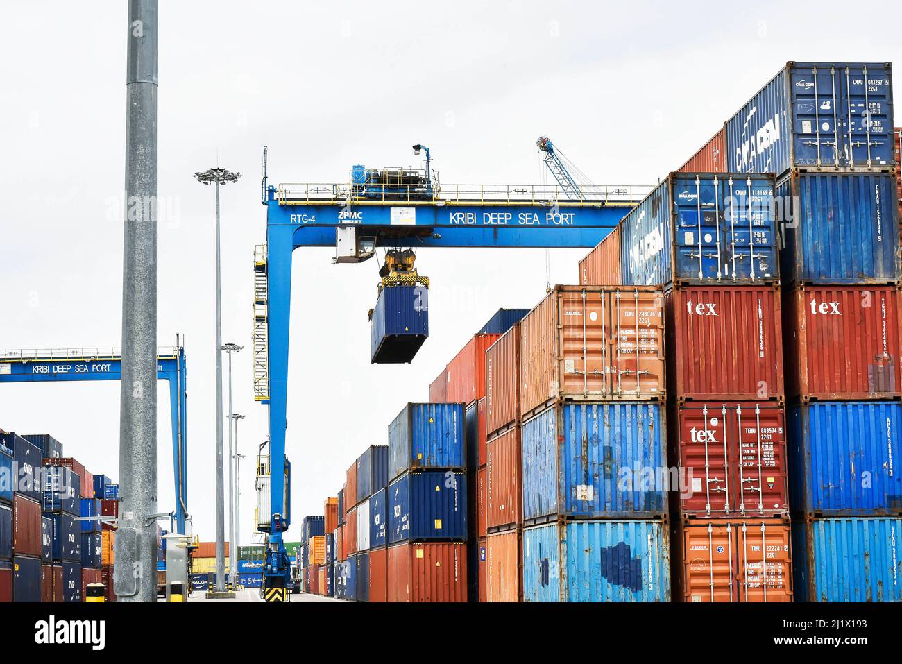 Kribi. 15th Mar, 2022. Photo taken on March 15, 2022 shows cargo containers  stored at Kribi Deep Seaport, Kribi, Cameroon. TO GO WITH "Feature:  Chinese-built port, highway in Cameroon boost economy, regional