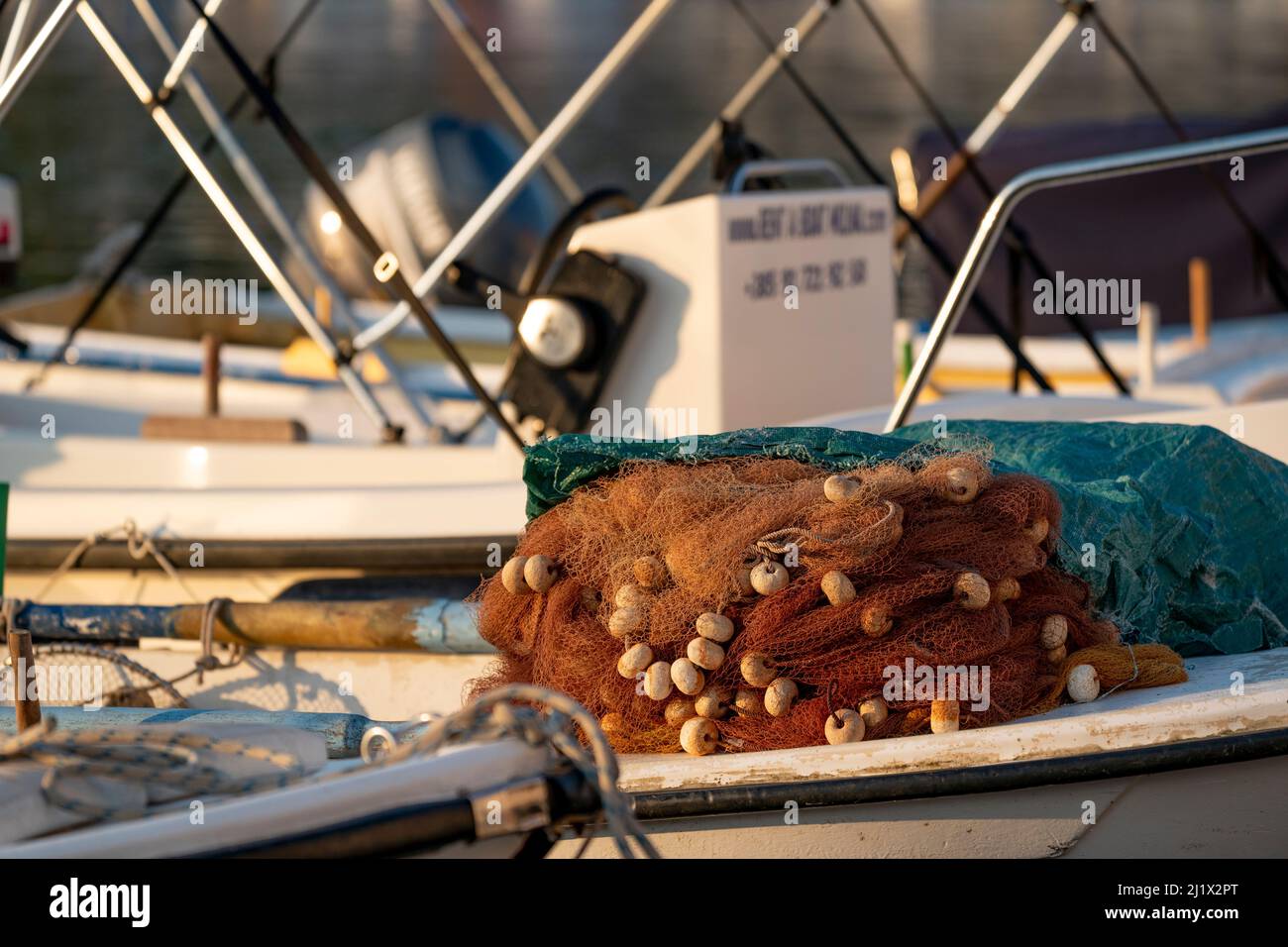 fishing net and small vessel in harbour  (CTK Photo/Ondrej Zaruba) Stock Photo