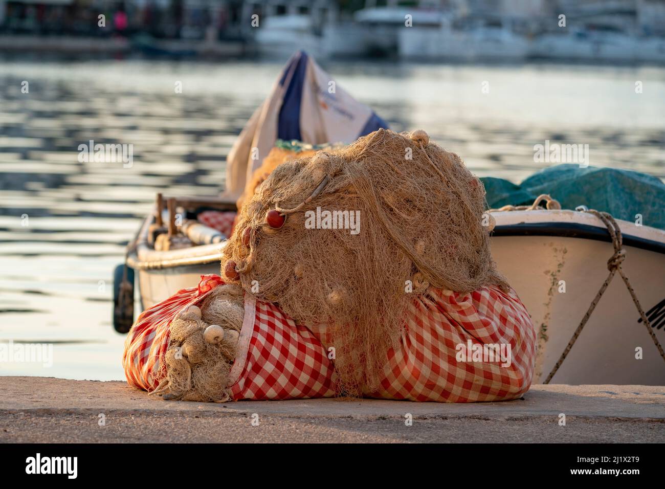 fishing net and small vessel in harbour  (CTK Photo/Ondrej Zaruba) Stock Photo
