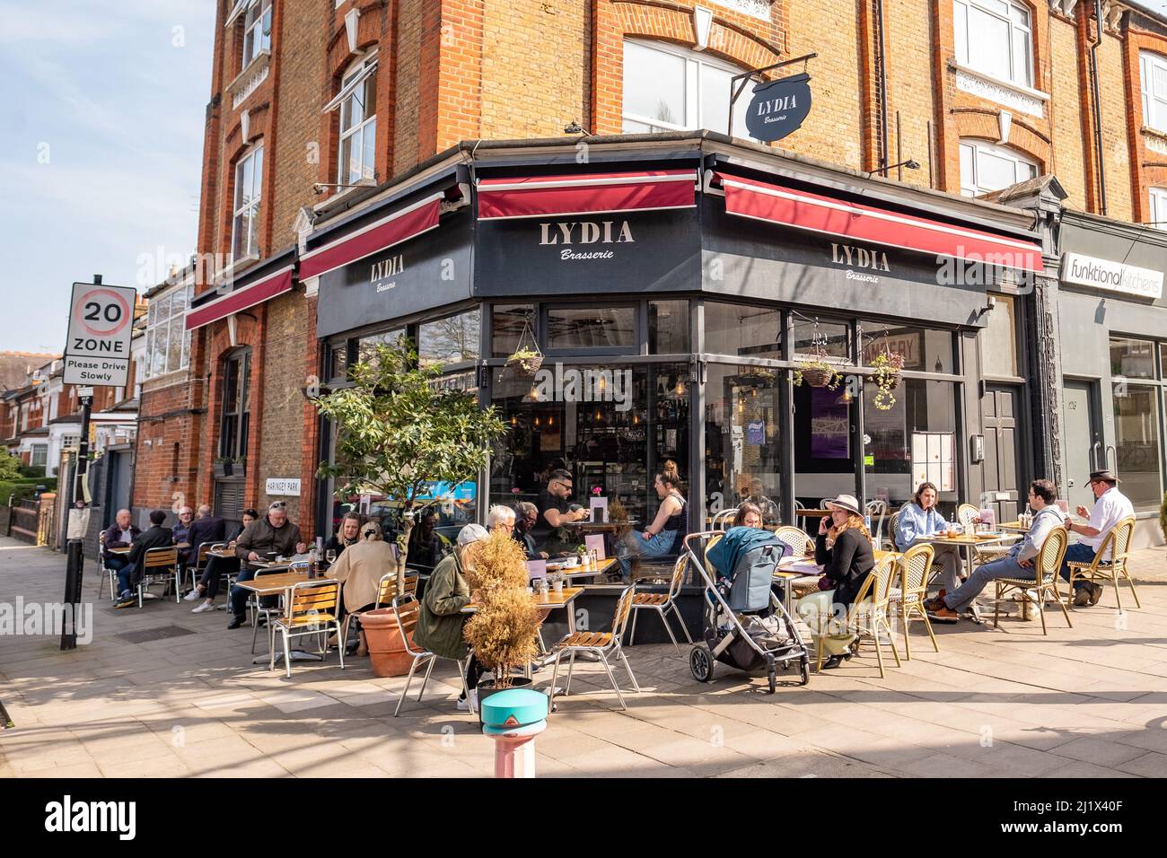 London- March 2022: Outdoor seating at cafe in Crouch End. An upmarket area of North London with many independent coffee shops and boutique Stock Photo