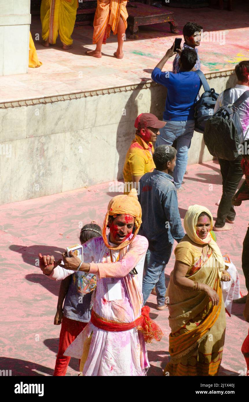 The devotess of Lord Krishna are celebrating Holi in Nandagaon, Uttar Pradesh, India. Stock Photo