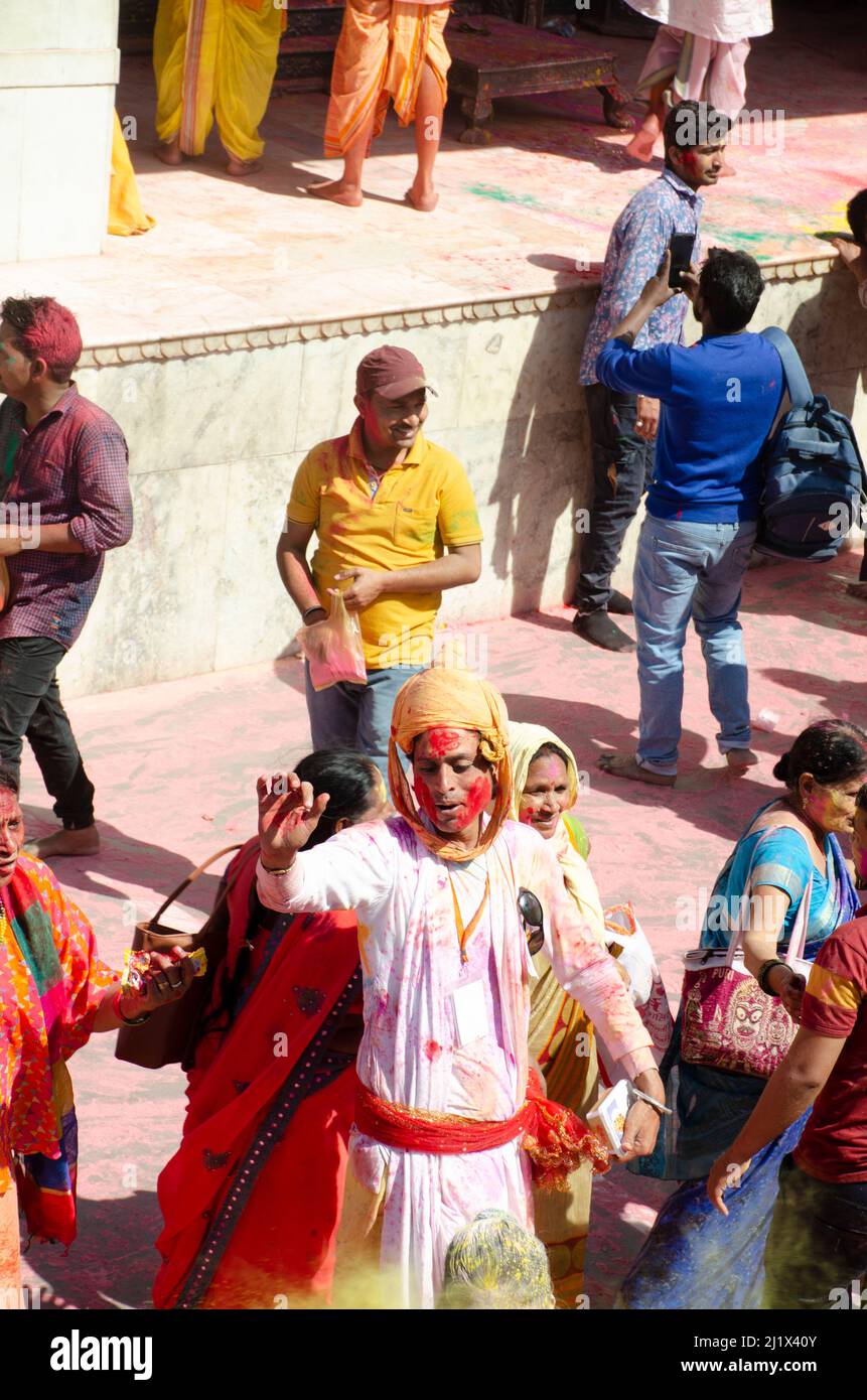 The devotess of Lord Krishna are celebrating Holi in Nandagaon, Uttar Pradesh, India. Stock Photo