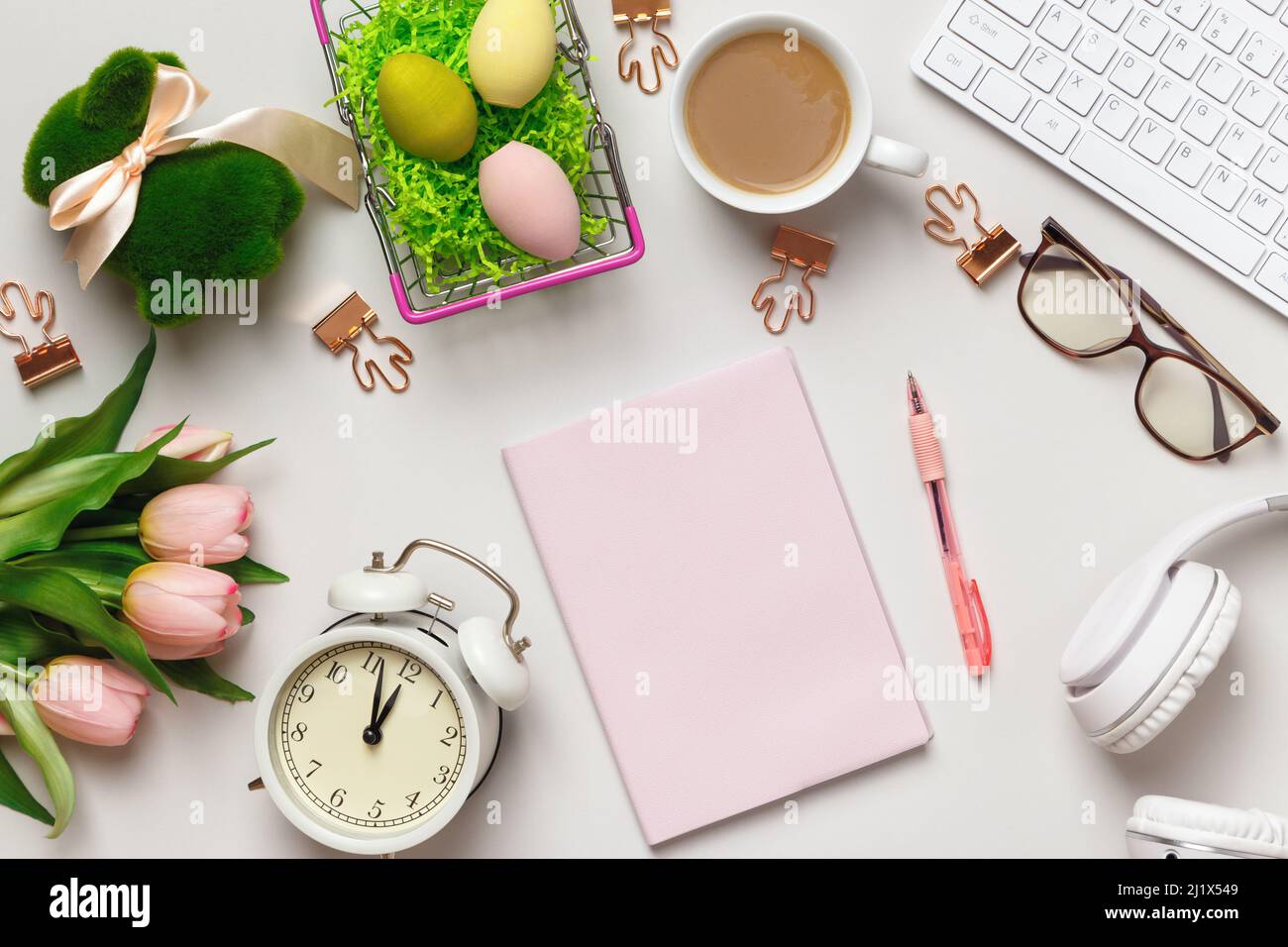 Top view of desktop with easter decorations. Stock Photo