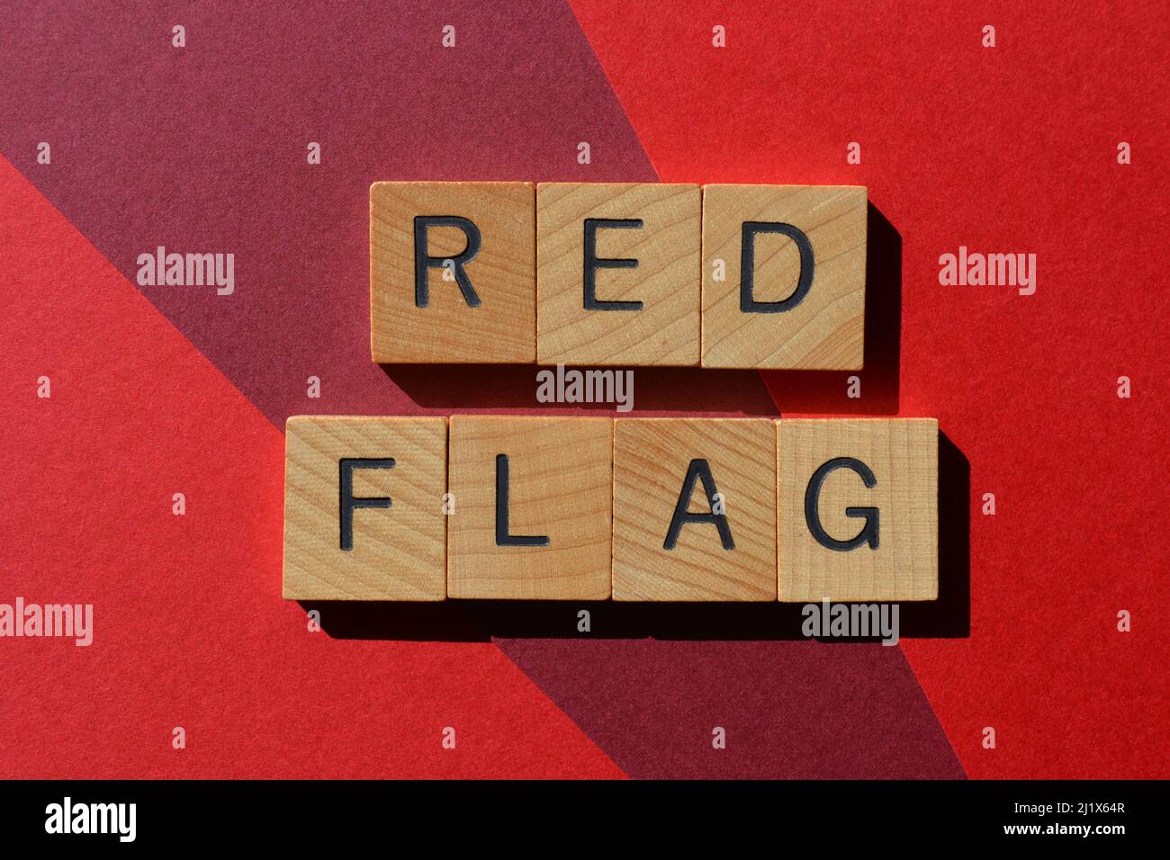 Red Flag, words in wooden alphabet letters isolated on red background