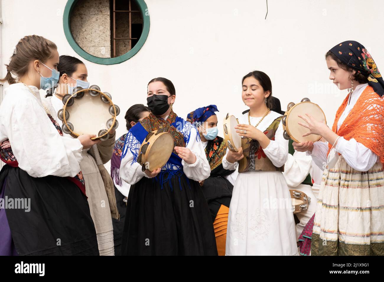 Vigo, Galicia, Spain, March 26 2022: A group of girls play Galician folk music with tambourines in Vigo Spain Stock Photo