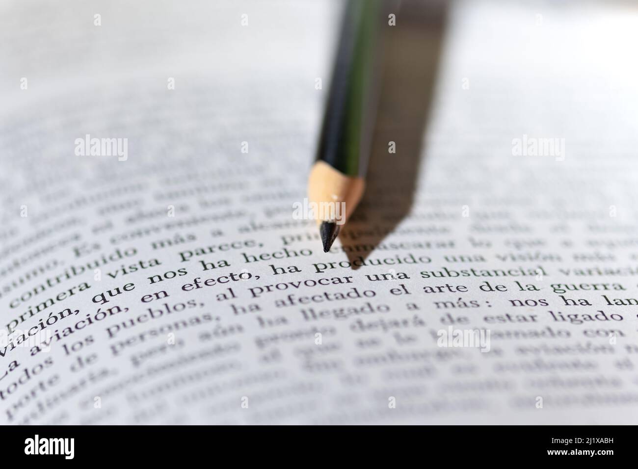 SCHOOL SUPPLIES. OPEN CHECKERED NOTEBOOK. OTHER CLOSED NOTEBOOKS, COLORED PENS. Stock Photo