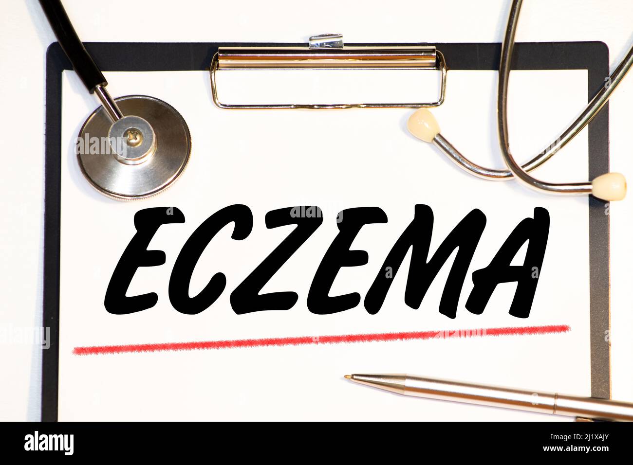 ECZEMA Top view, Doctor writing medical records on a clipboard, medical equipment. Stock Photo