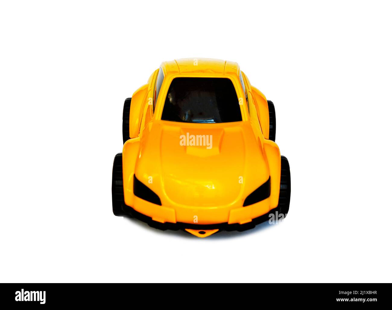Children's yellow plastic toy car on a white background Stock Photo