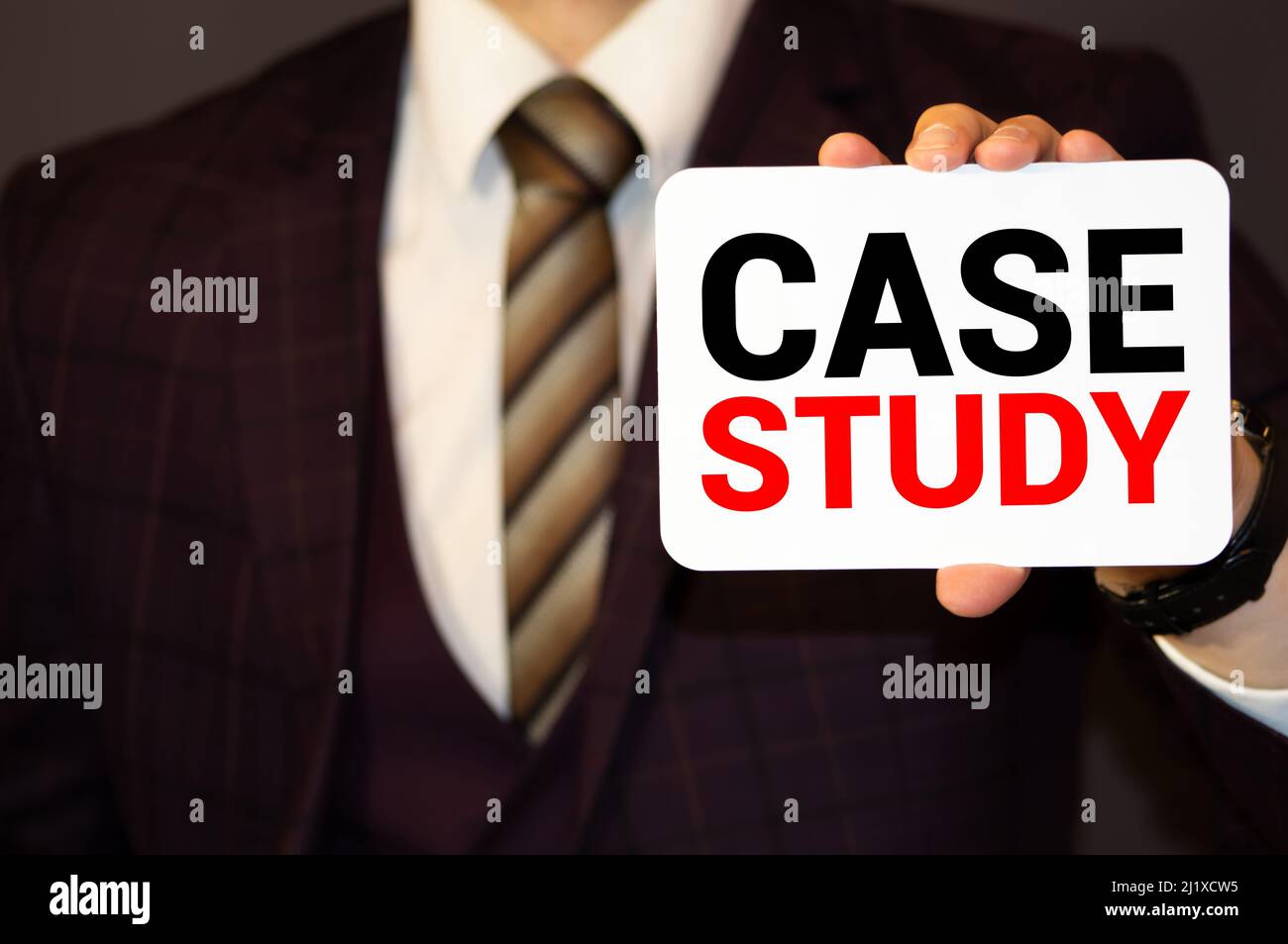 Case study memo written on a notebook with pen. Stock Photo