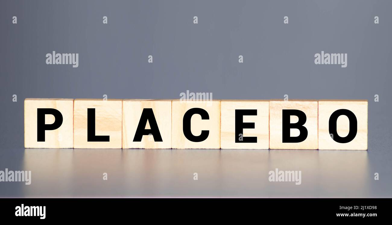 Placebo word written on blocks. Placebo effect, fake medical treatment Stock Photo Alamy