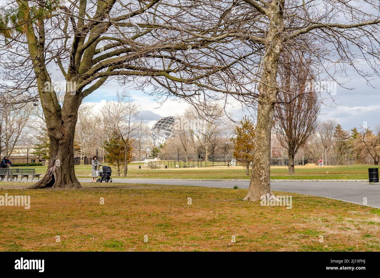 Unisphere Statue with meadow, trees and way in front, Flushing-Meadows-Park, Queens, New York City during overcast winter day, horizontal Stock Photo