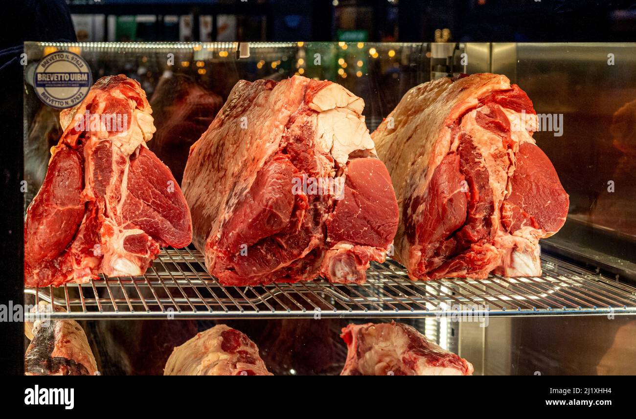 Cuts of beef on display in a UK steak restaurant window. Stock Photo