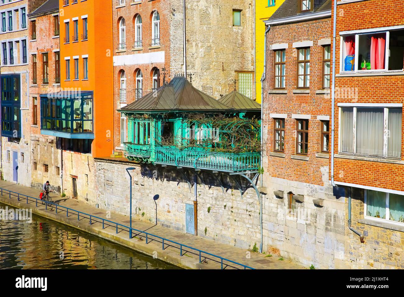 Namur (Quai des Joghiers) , Belgium - March 9. 2022: View on typical colorful waterfront houses, balconies at river sambre Stock Photo