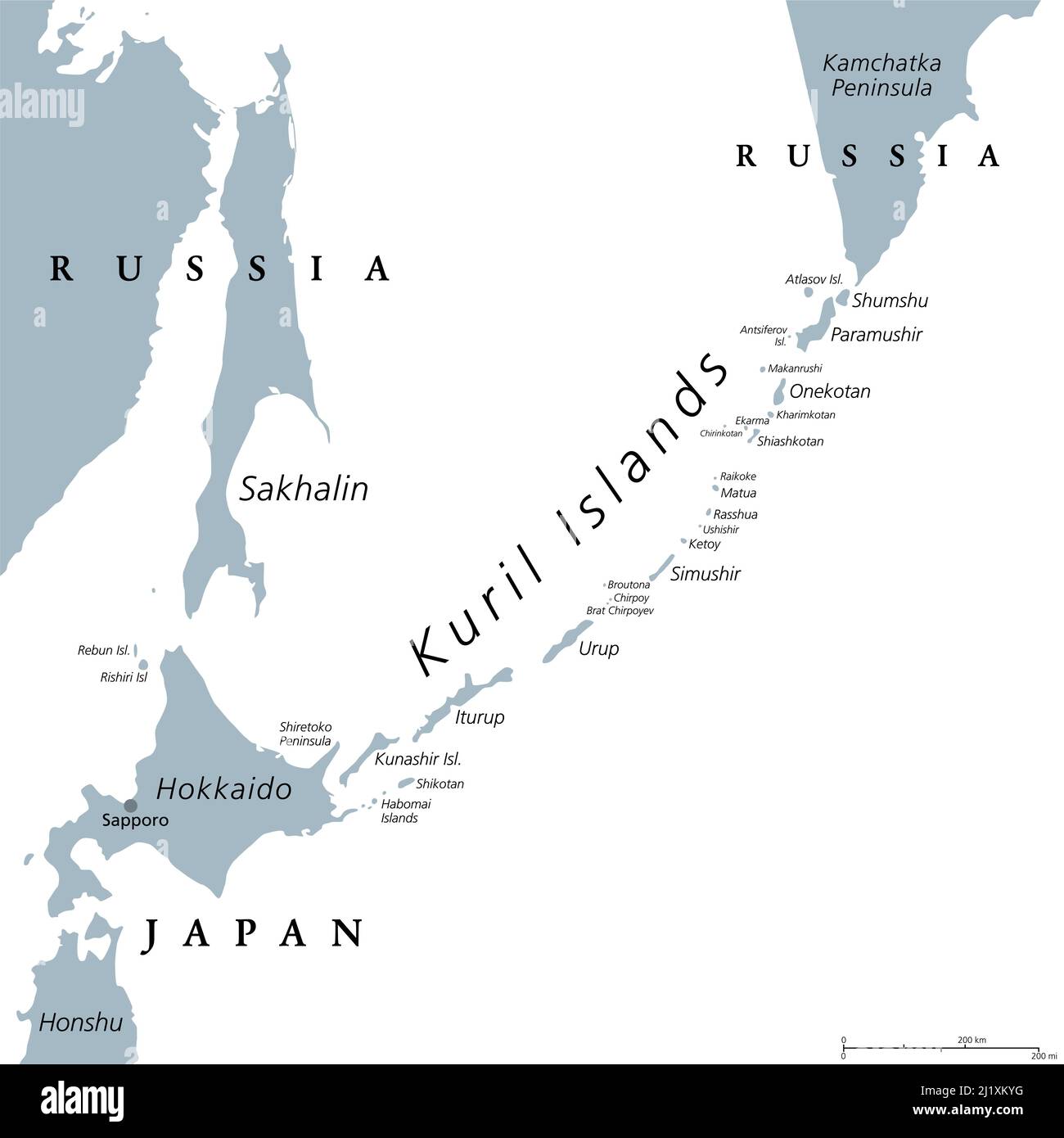 Kuril Islands, gray political map. A volcanic archipelago part of Sakhalin Oblast in Russian Far East. Stretches from Hokkaido in Japan to Kamchatka. Stock Photo