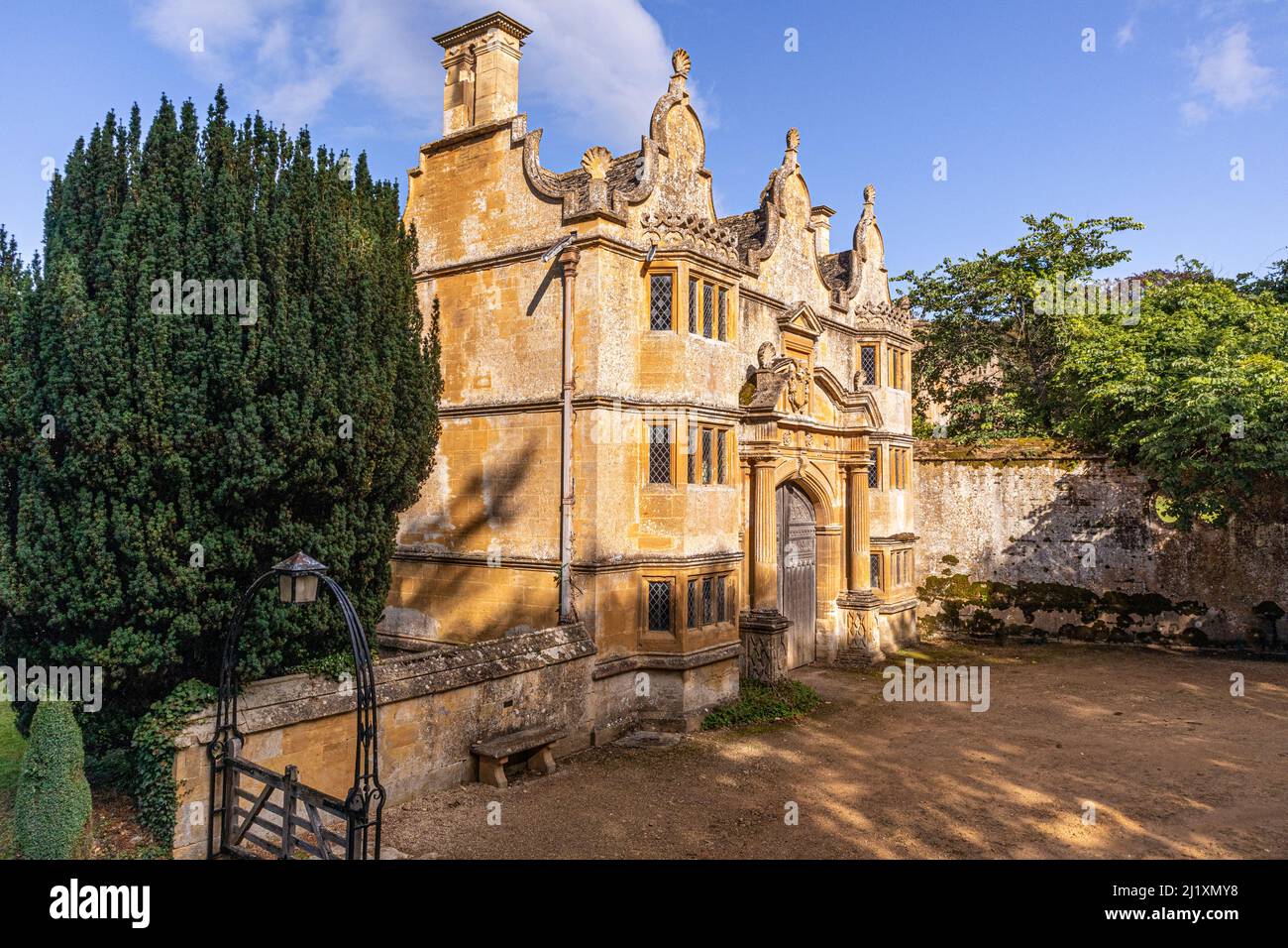 The Jacobean Cotswold stone gatehouse to Stanway House, Stanway, Gloucestershire, England UK Stock Photo