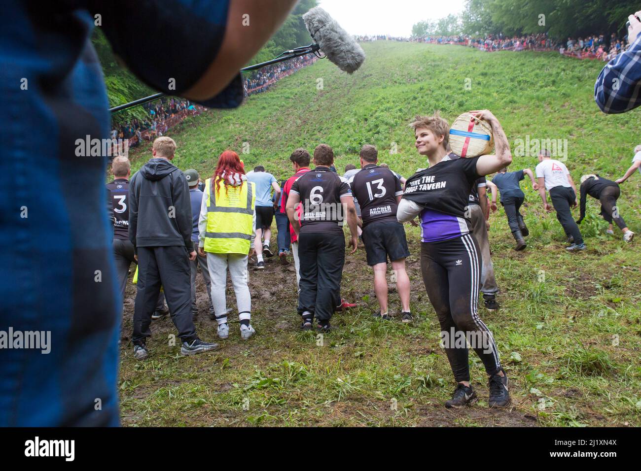 Gloucester, UK. The annual cheese rolling race held at Coopers Hill