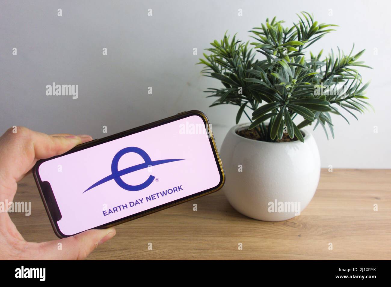 KONSKIE, POLAND - March 26, 2022: Earth Day Network logo displayed on mobile phone Stock Photo
